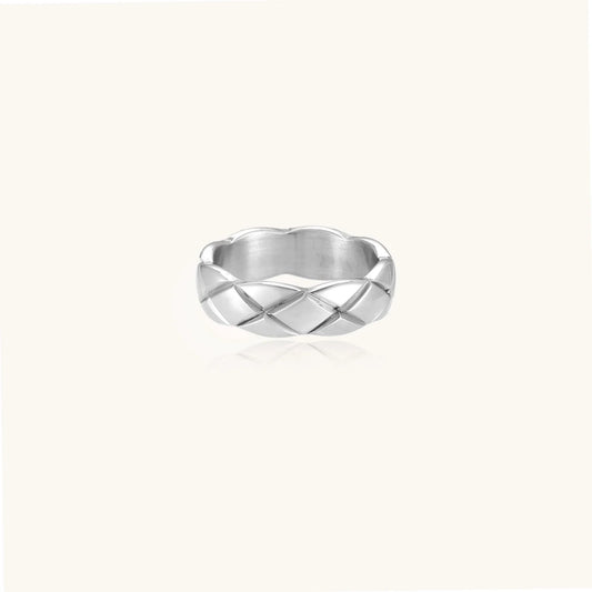 Braided stainless steel band ring with geometric interwoven strands in brushed silver finish on white background